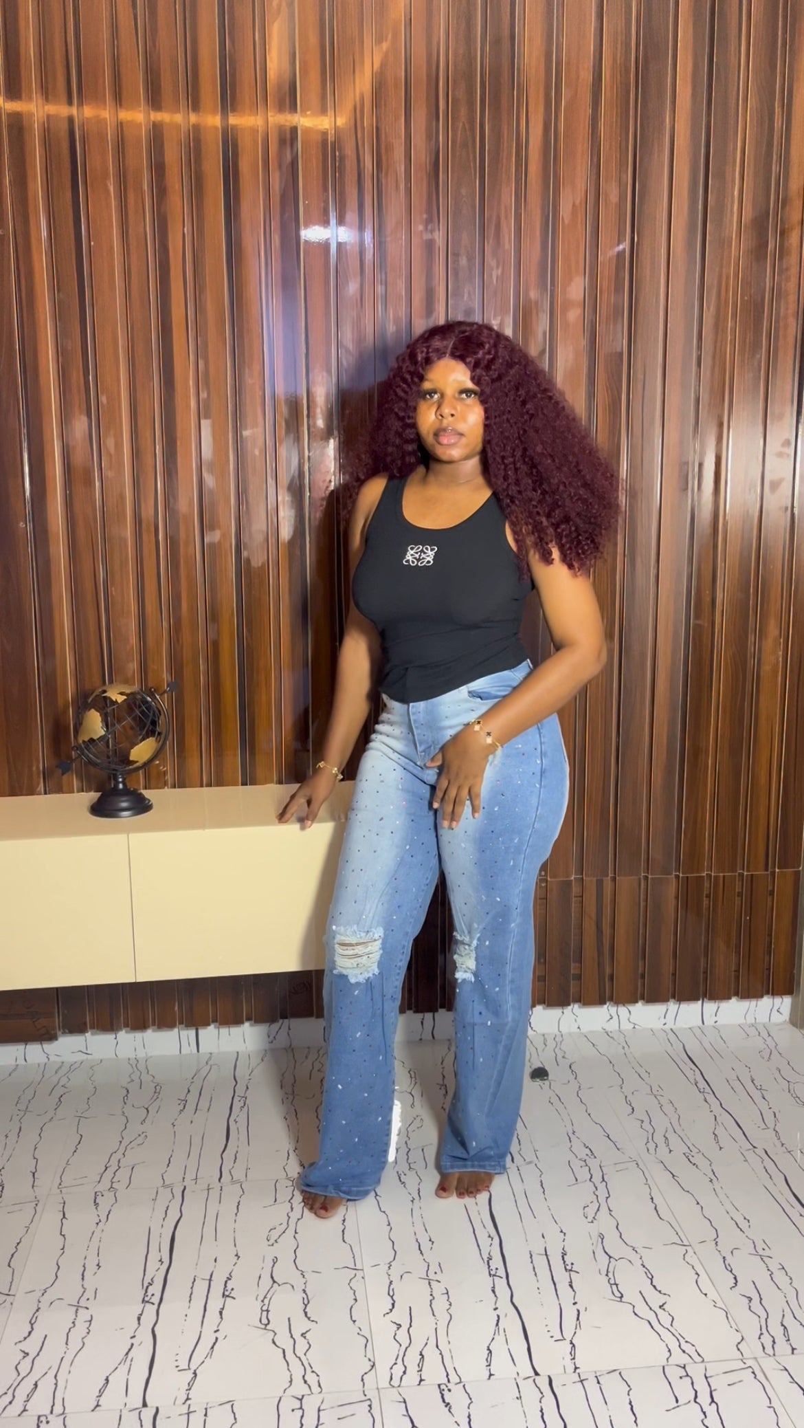 Light blue beaded ripped jeans